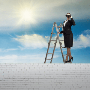 A businesswoman climbs a ladder and looks through binoculars