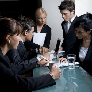 Business people gathered for a meeting