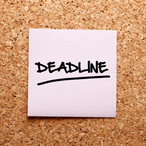 The word deadline written in a pink sticky note