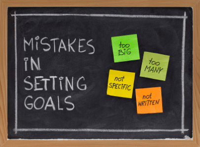 Blackboard showing mistakes in setting goals
