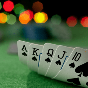 Winning Poker hand on green baize