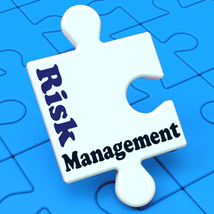 Risk management written on a puzzle piece