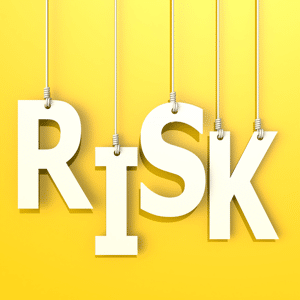 The word risk on an orange background