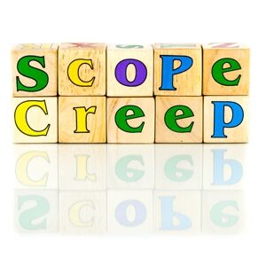 Scope creep spelt out in colourful wooden blocks on a white background