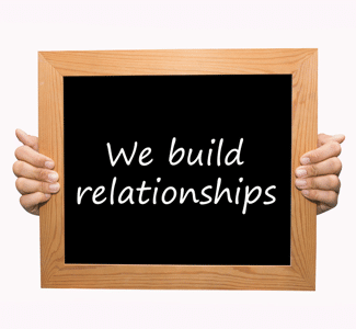 Board reading: We Build Relationships