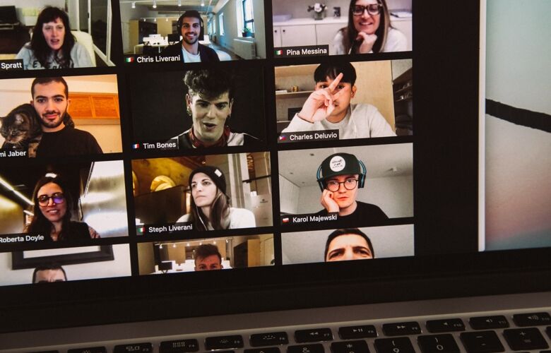 Video call with multiple business people on a laptop screen